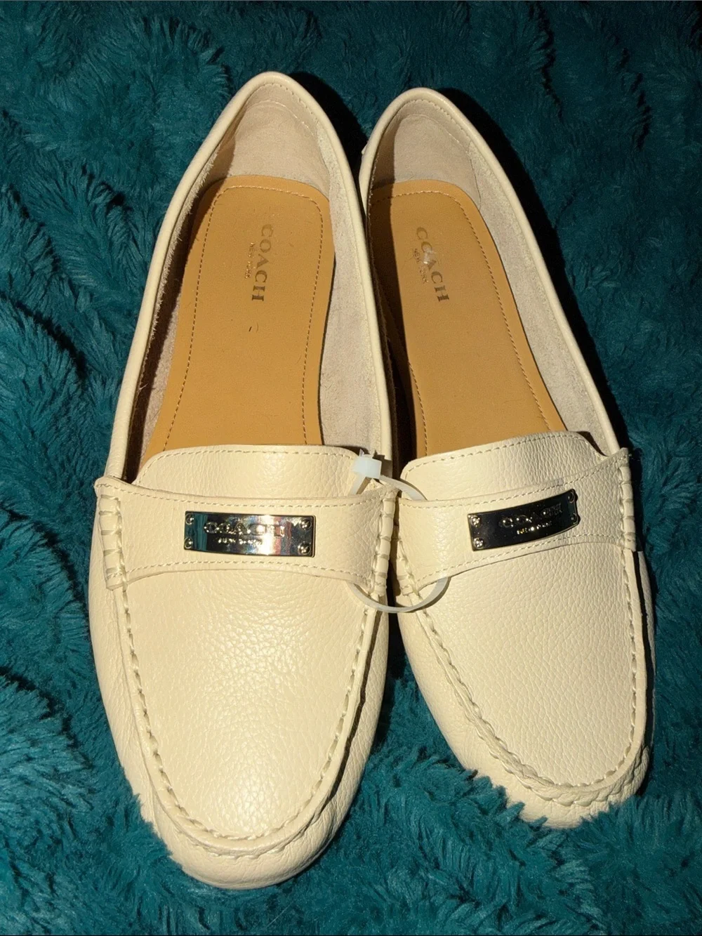 Coach Cream Leather Slip-On Loafers with Silver Metal Plaque 9.5
